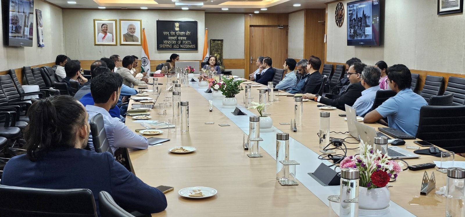 Full conference room view with all participants